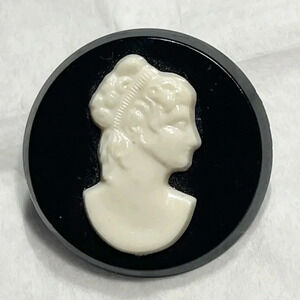 Vintage black and white cameo brooch, plastic, round midcentury, 1950s-60s